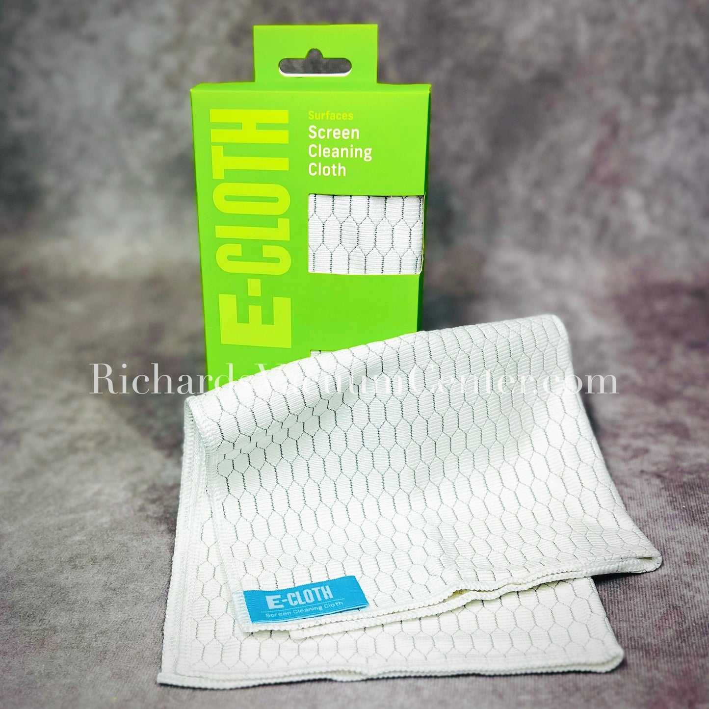 A screen cleaning cloth with a honeycomb texture.