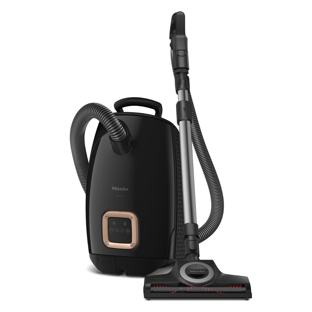 Black vacuum cleaner on a white background