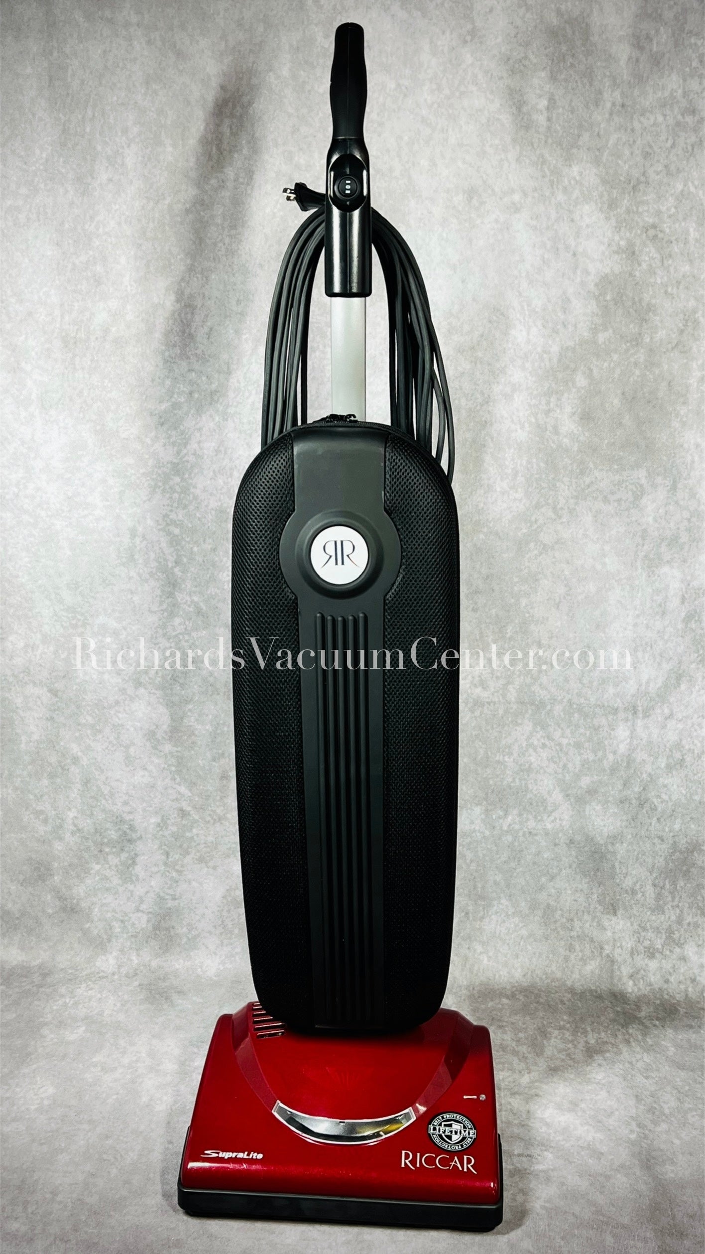 A Riccar SupraLite Premium upright vacuum cleaner.